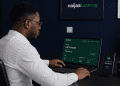 Nigerian professional reviewing AI platform earnings dashboard in Lagos home office — naijaai.com.ng